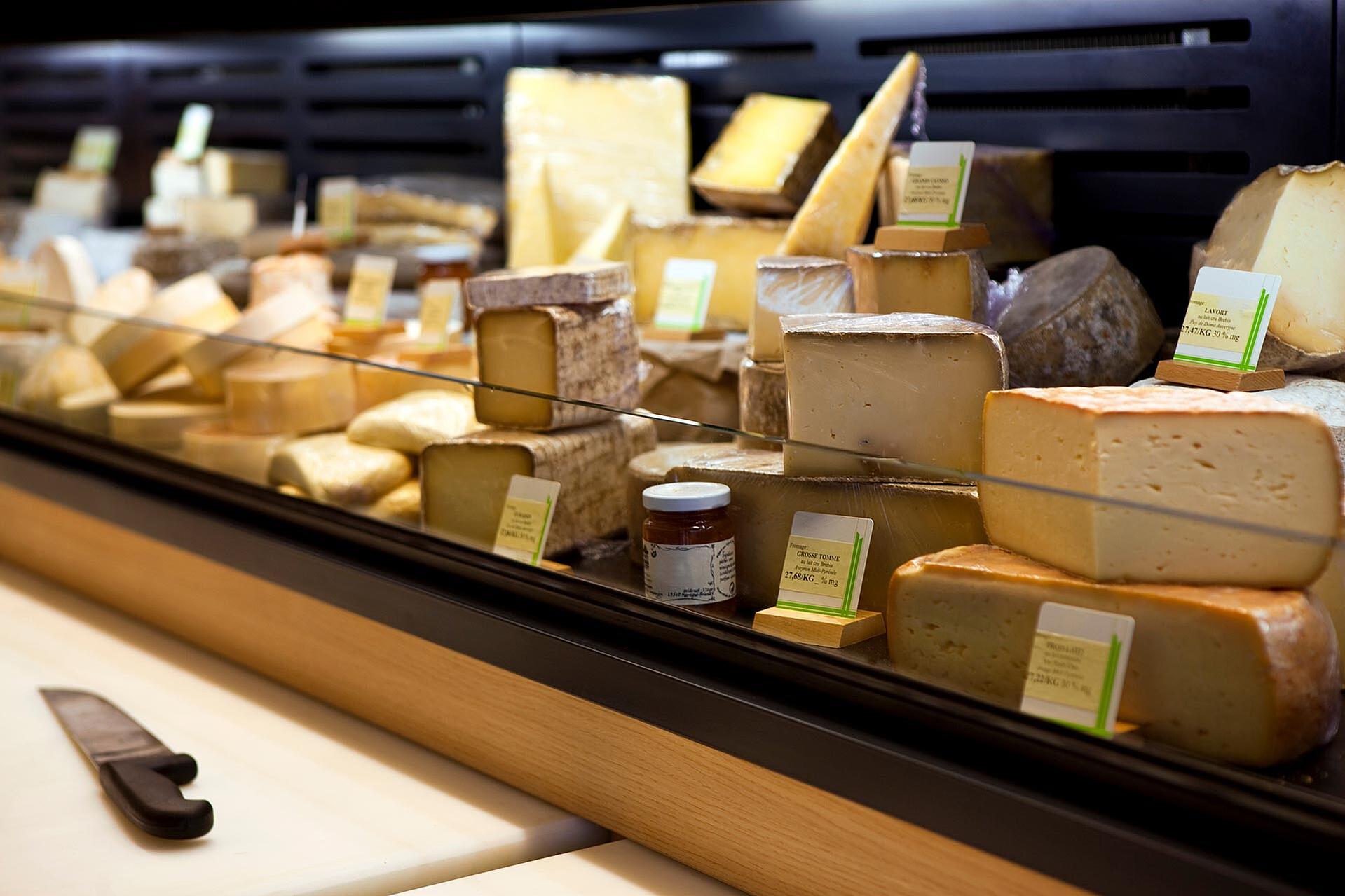 Cheeses at a counter